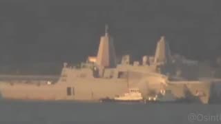 Japanese media and local authorities report a fire aboard the USS New Orleans