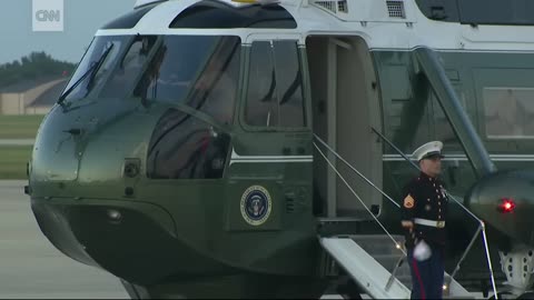 Trump stops to retrieve Marine's hat