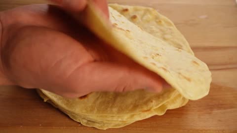 Just pour boiling water into the flour! Thin tortillas in a frying pan!