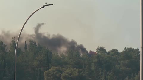 Greece deploys helicopters to battle wildfire near Athens