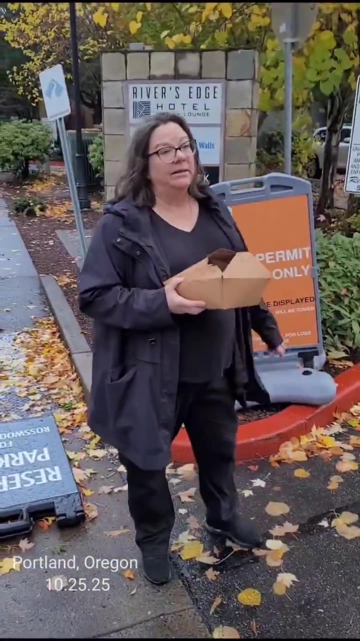 Lady followed several journalists to their hotel, sat down next to them in the lounge,