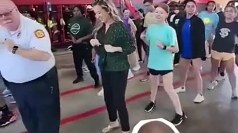 POLICE CHIEF DANCING WITH THE COMMUNITY