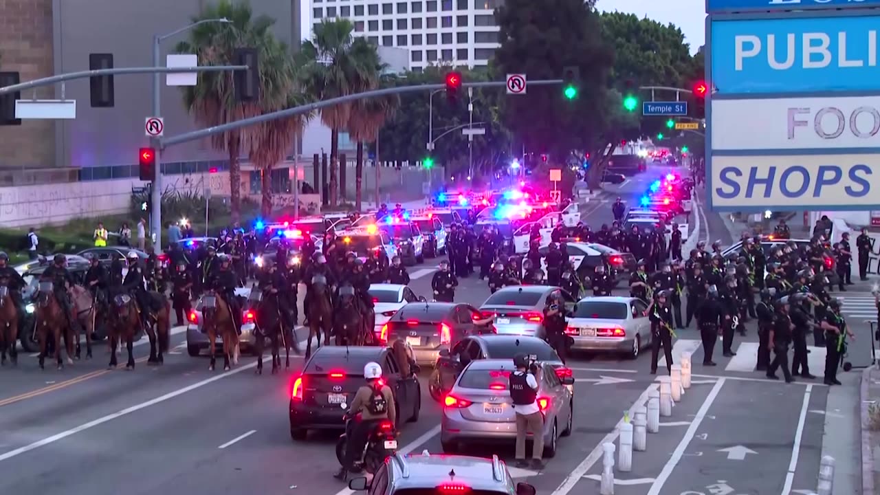 Police scale up presence as curfew kicks in for downtown LA