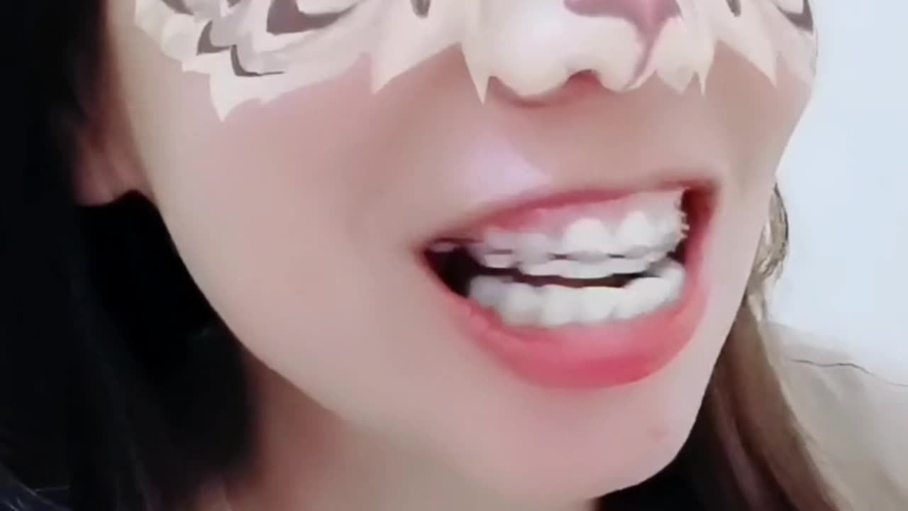 She applies the braces on her own.