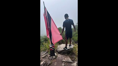 On top of the world with the spirit of Trinidad and Tobago! 🇹🇹✨ #IslandLove #MountainTopVibe