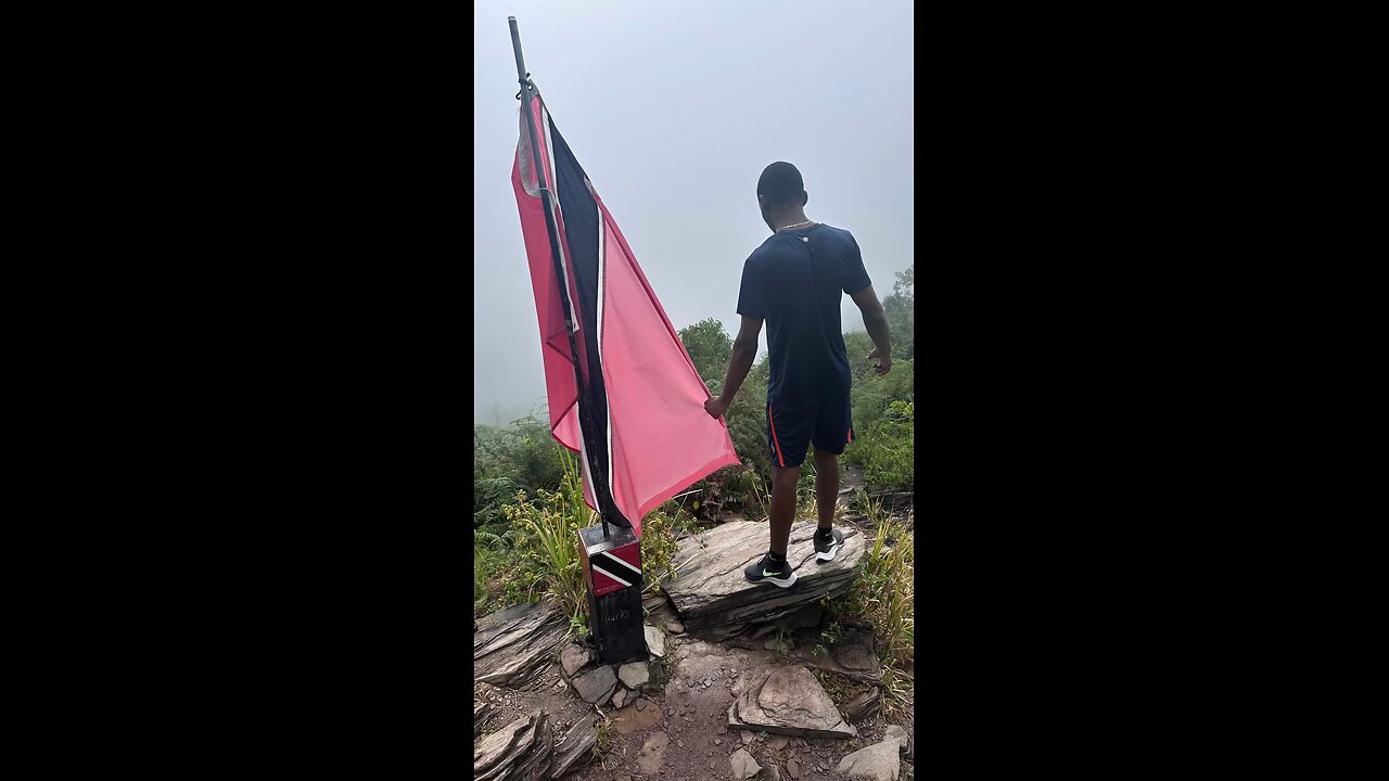 On top of the world with the spirit of Trinidad and Tobago! 🇹🇹✨ #IslandLove #MountainTopVibe