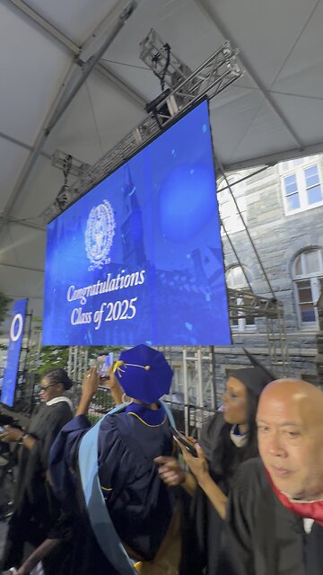 Gemach DAO on stage at Georgetown University Commencement