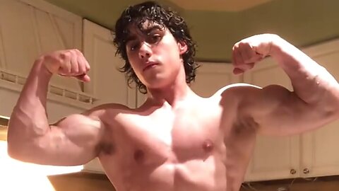 18 years old teen boy flexing muscles