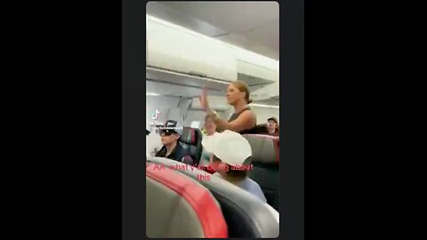 Part 3 of Lady wants off the plane because "that mother****er back there ain't real" Reptilian?