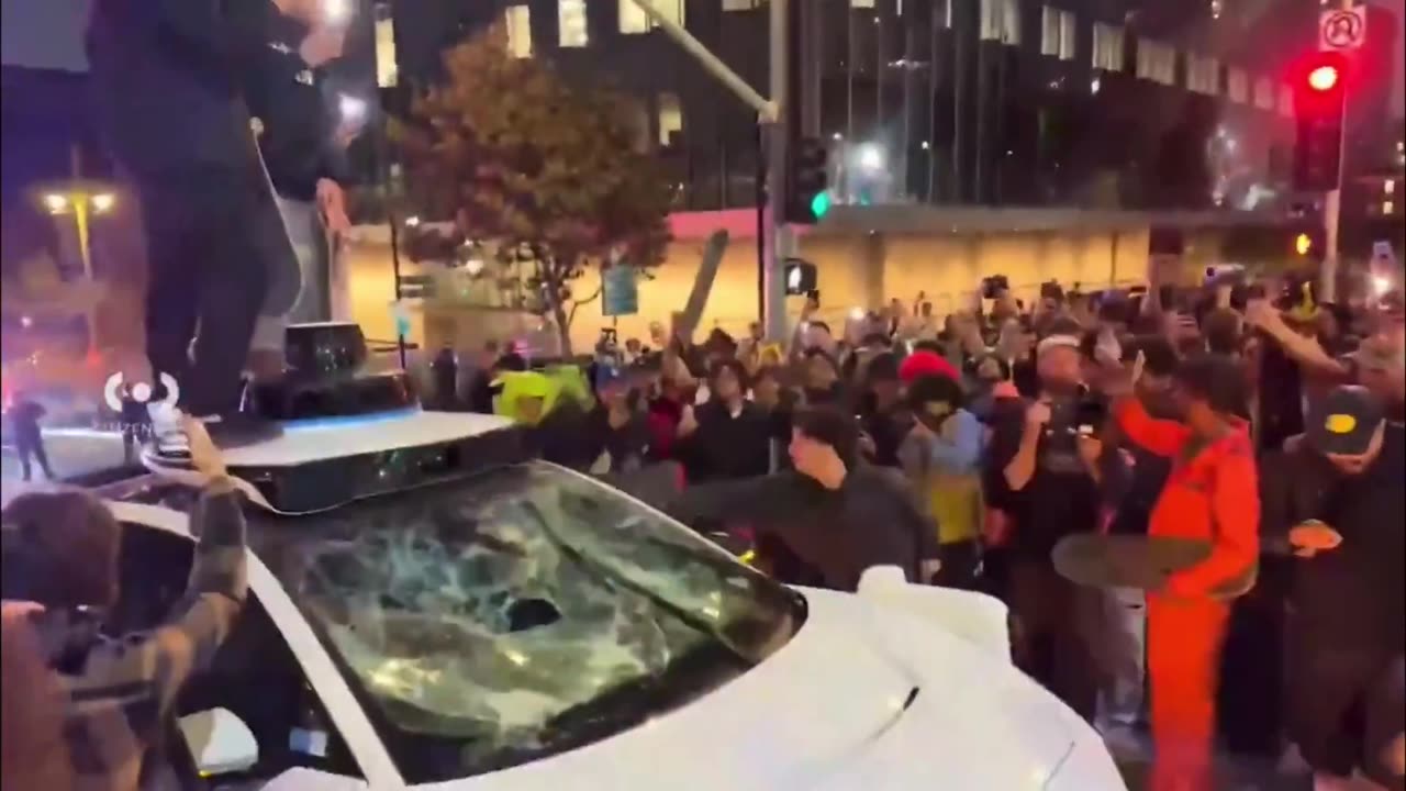 LAPD stand around as hundreds of skateboarders destroy downtown Los Angeles.
