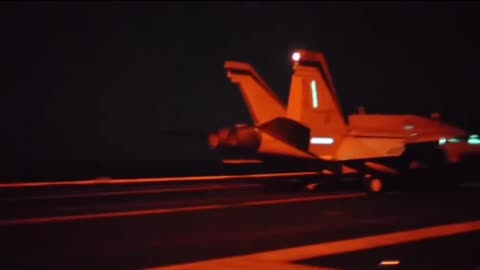 Night-Time Carrier Landing of a US F/A-18 Super Hornet on