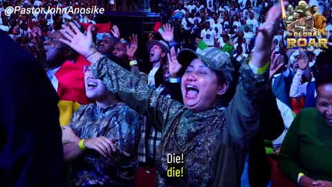 Watch Pastor John lead 5000 Saints from all the counties In the world in a Mighty Roar