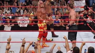 John Cena and Batista pose with Hulk Hogan after Monday Night Raw in a special moment