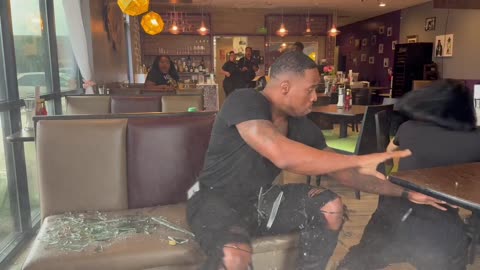 Food influencers were hit by a car while reviewing a burger inside a restaurant