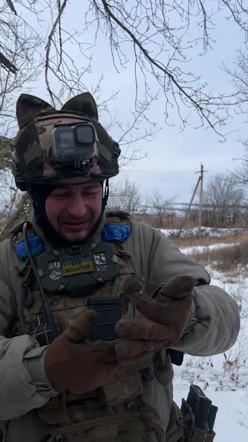 Ukrainian Soldier Befriends a Field Mouse