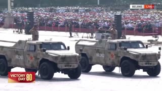 Autonomous submarines, attack planes and helicopters roll past Tiananmen Square.