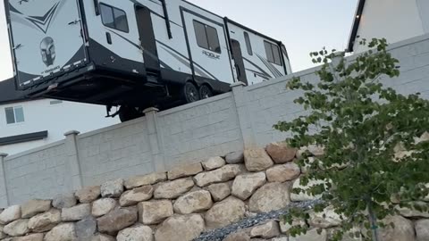 RV Hangs Off Edge of Property