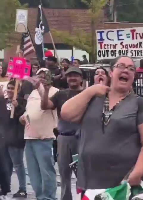 Morbidly obese squatemalan holding a Mexican flag...