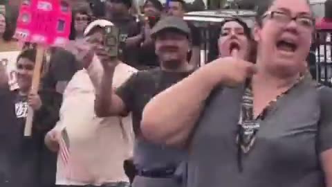 Morbidly obese squatemalan holding a Mexican flag...