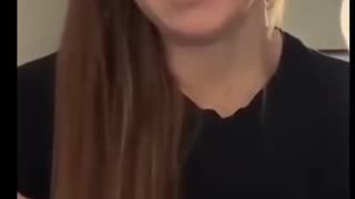 Officer coming forward to stand for the Oath she took to uphold the rights of all Canadians