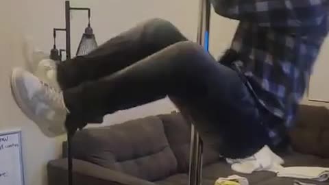 Karaoke Singer Crashes Into Fish Tank With Pole