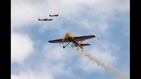 Footage at the Mochishche air show of the professional piston aircraft aerobatic team First Flight