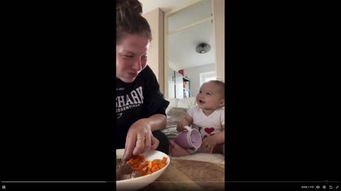 Quick Smile: Life! Watch this baby's face and you know what love is