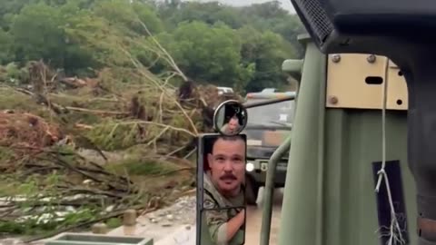 Texas National Guard troops evacuated a group of campers needing assistance near