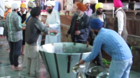 Cleaning the dishes at Langur -- the World's largest Free Kitchen