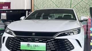 Car sales lady doing live stream with 1 shoe off!