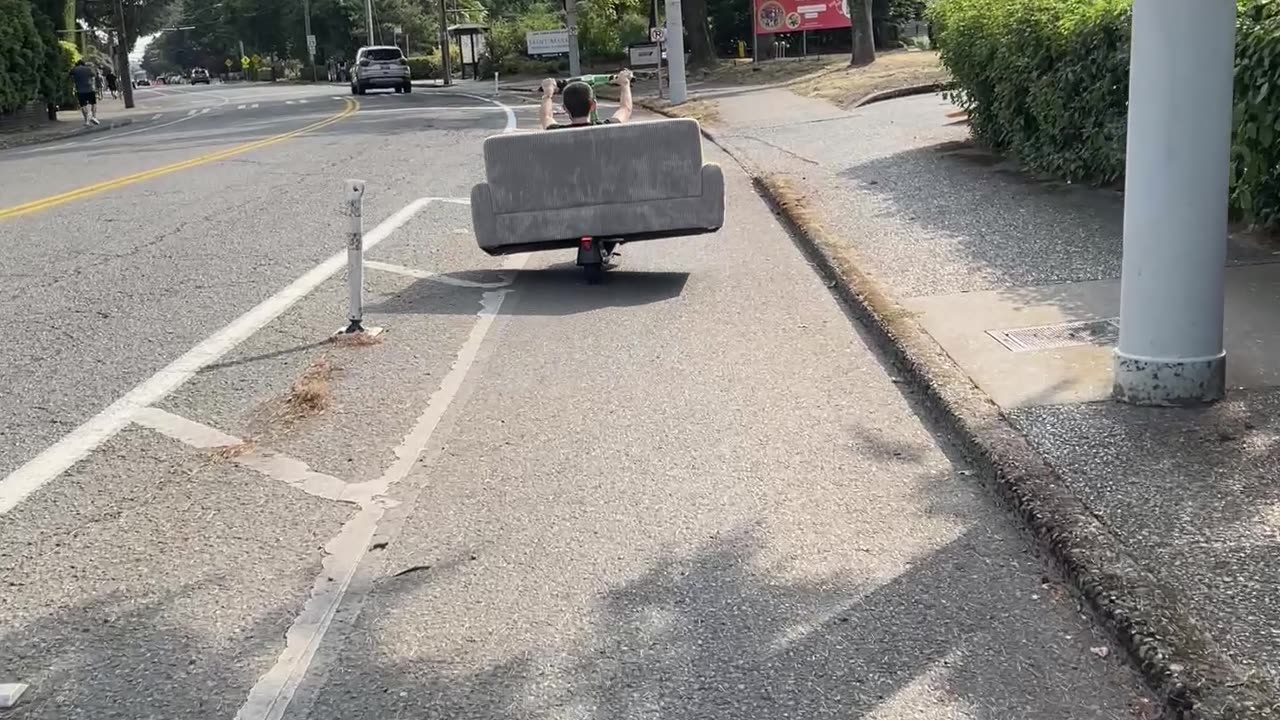 Couple Use Electric Scooter To Transport Couch