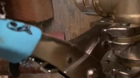 Using tool to release a shark bite plumbing connection