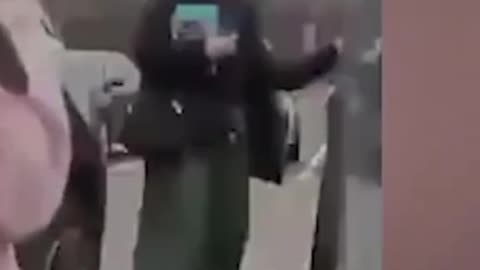 Woman caught on camera allegedly vandalizing Tesla