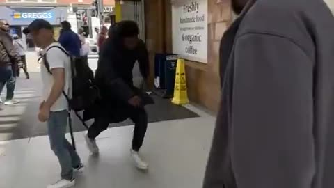 Black Robs Englishman In London