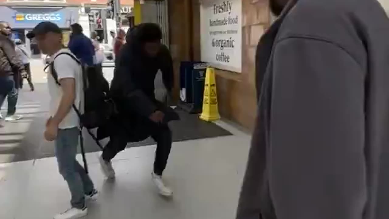 Black Robs Englishman In London