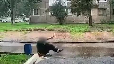 Russian Man Fall Through Large Glass Canister