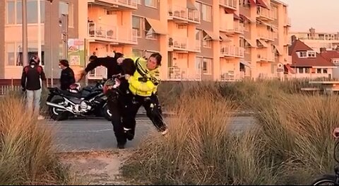 NETHERLANDS : When a fat and slow female cop go's power hungry