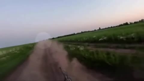 Ukrainian Soldier On Back of ATV Nudges Incoming Russian Drone to the Side