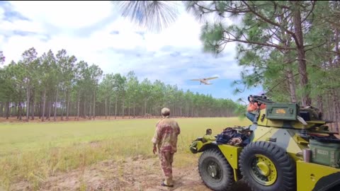 Robin Sage - Airfield flyby beside "Black Betty" the Ferret Scout Car
