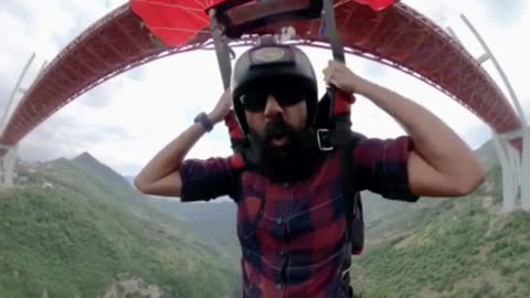 Base Jumper Takes Thrilling Plunge from Duge Bridge