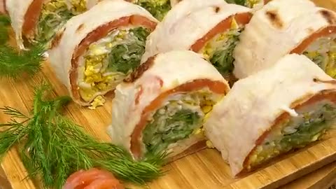 Juicy rolls of lavash and red fish