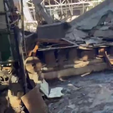 Russian Soldier Films Aftermath oh HIMARS Strikes on Russian Vehicle Hanger