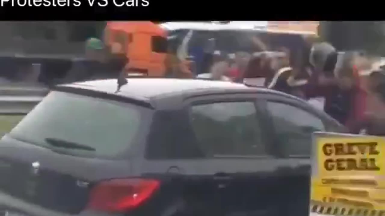 In Florida, this is perfectly legal if you are in your car and surrounded by protesters.