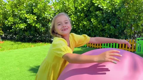 Alice plays with Giant Surprise Egg