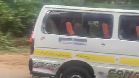 Kenyan Man Catches a Ride to Work on Roller Skates