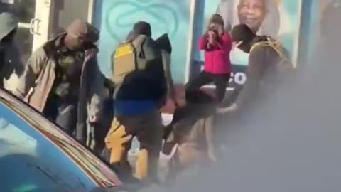 Slowed-Down Video Shows the Armed Man in Minneapolis Start to Draw Pistol on Border Patrol Agents