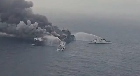 NOW - Singapore-flagged cargo ship burns off India coast, 4 crew members still missing.