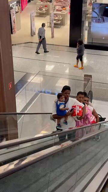 guy shopping at mall for a new ps5