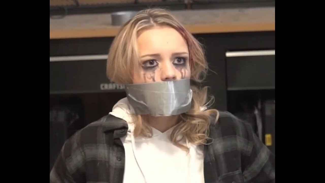 girl wrap tape gagged