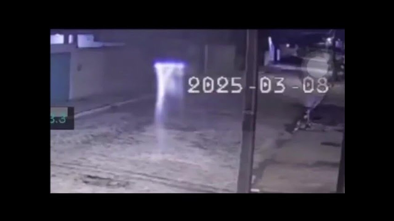 Surveillance camera captured luminous beings with violet light above their heads